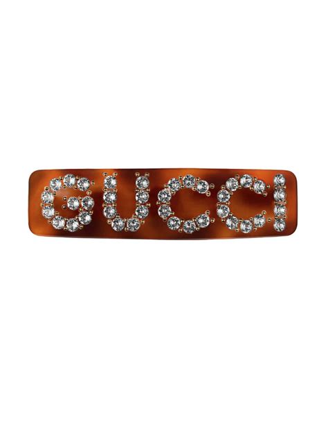 broche gucci cabello